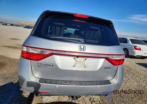 2012 Honda Odyssey Touring z USA, uszkodzony, nr VIN 5FNRL5H94CB076776